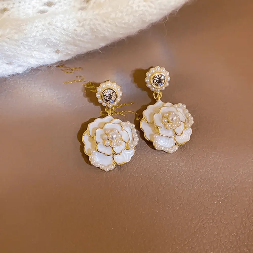 White Rose Drop Earrings by Zivnaaz