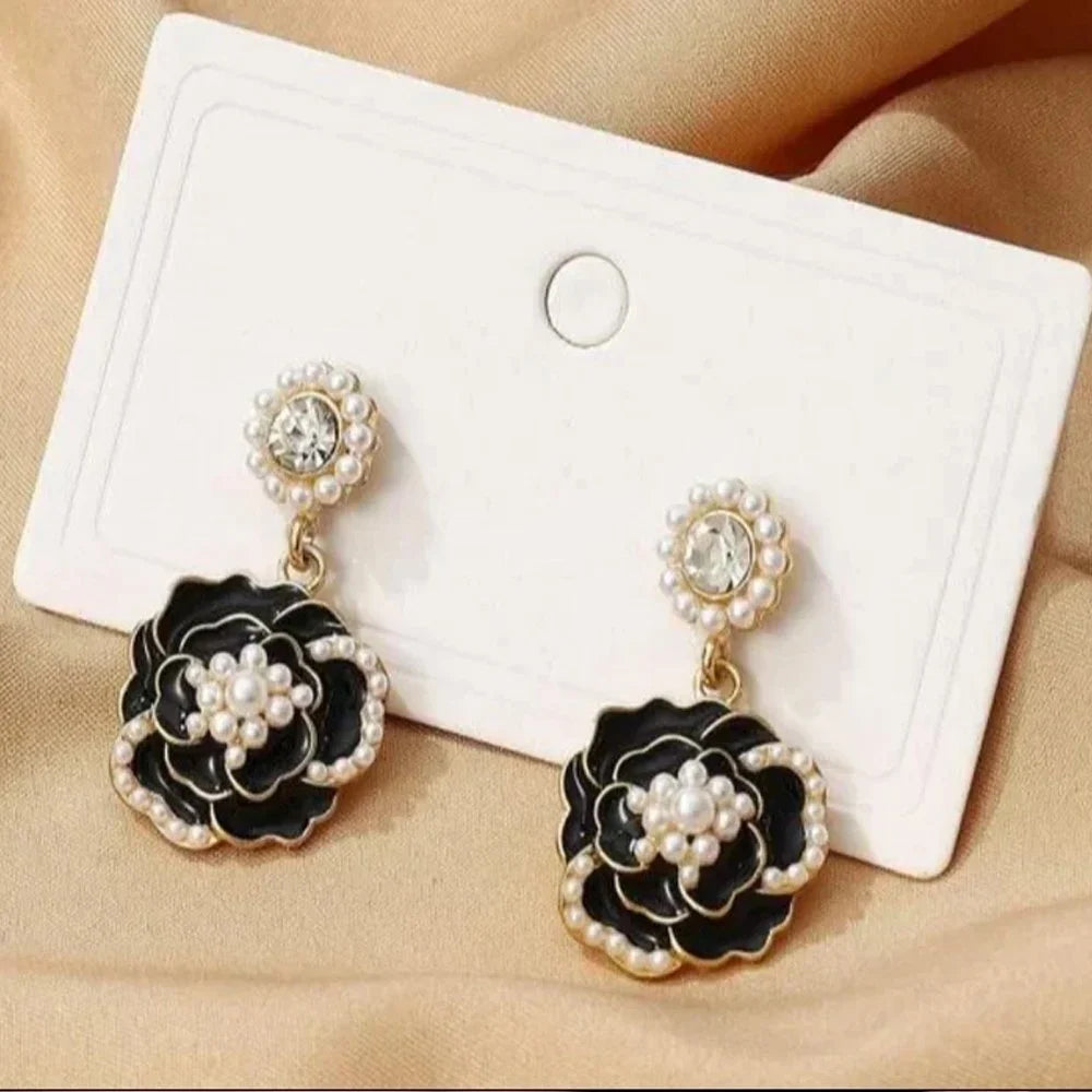 Black Rose Drop Earrings by Zivnaaz